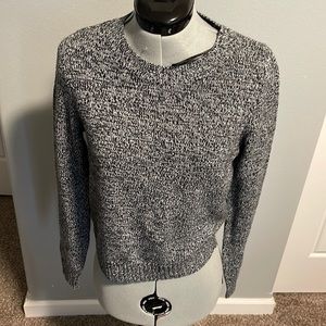 Divided woman’s sweater